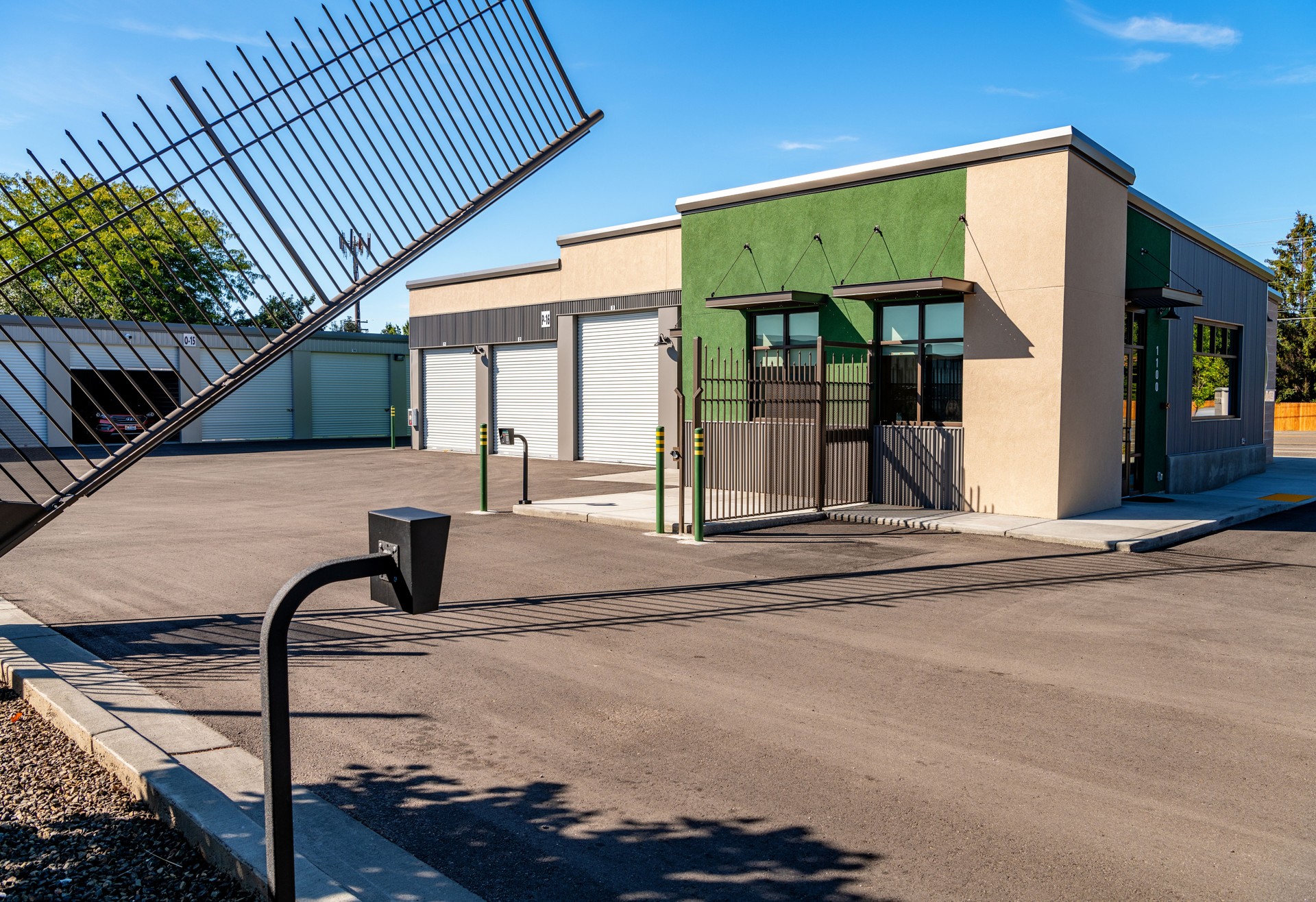 Local mini storage unit facility with entrance gate opening