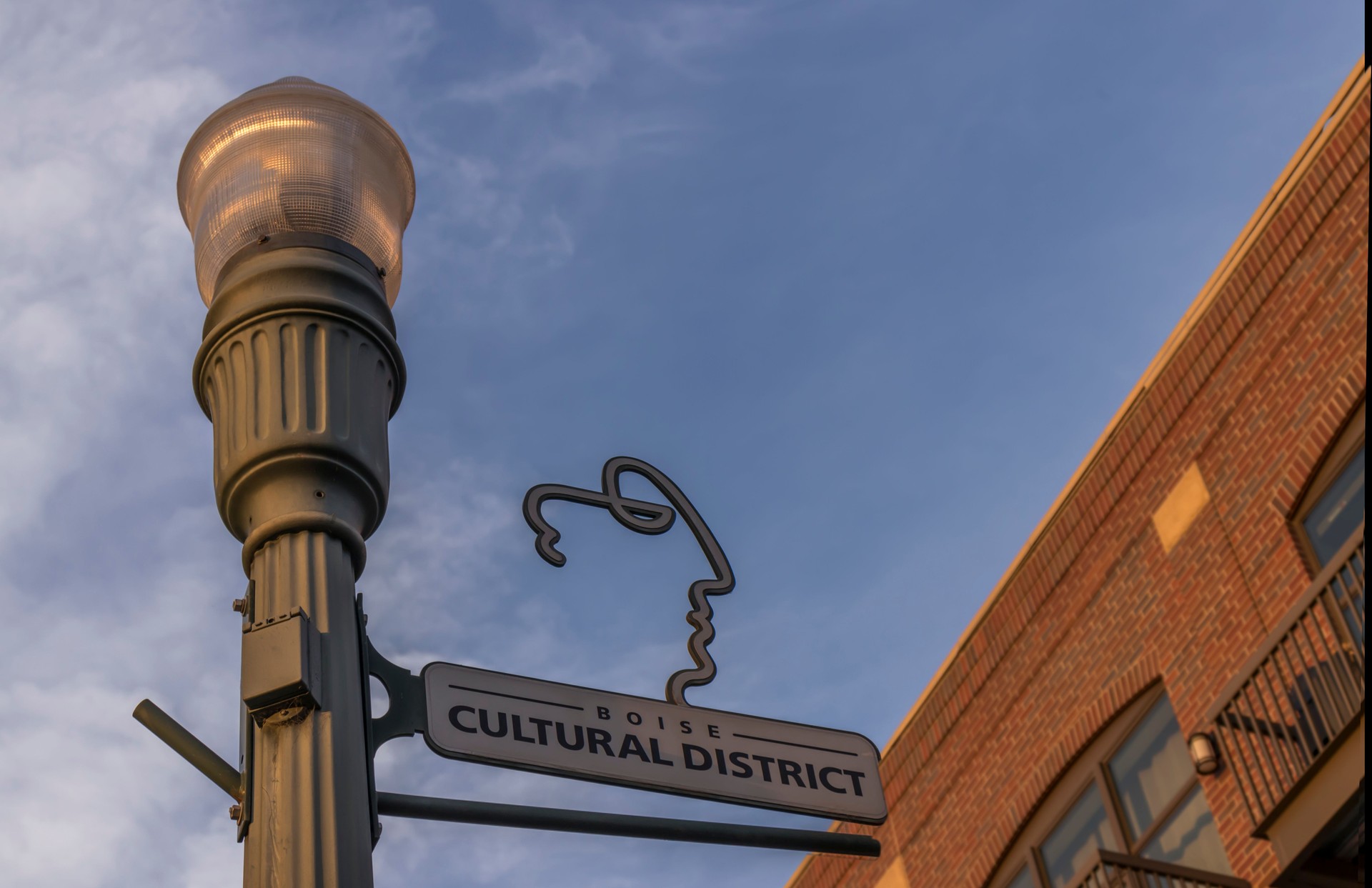 Street lighting and signage in Boise's Cultural District on a summer evening. Boise, Idaho, USA.